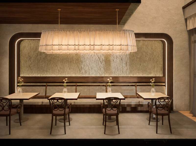 Dining room with a pleated linen pendant lamp, wooden tables and bentwood chairs