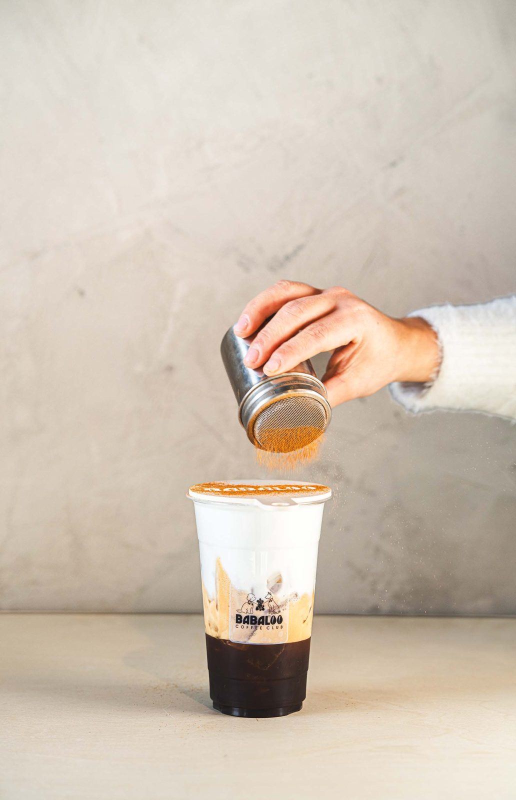 A splash of milk poured over espresso