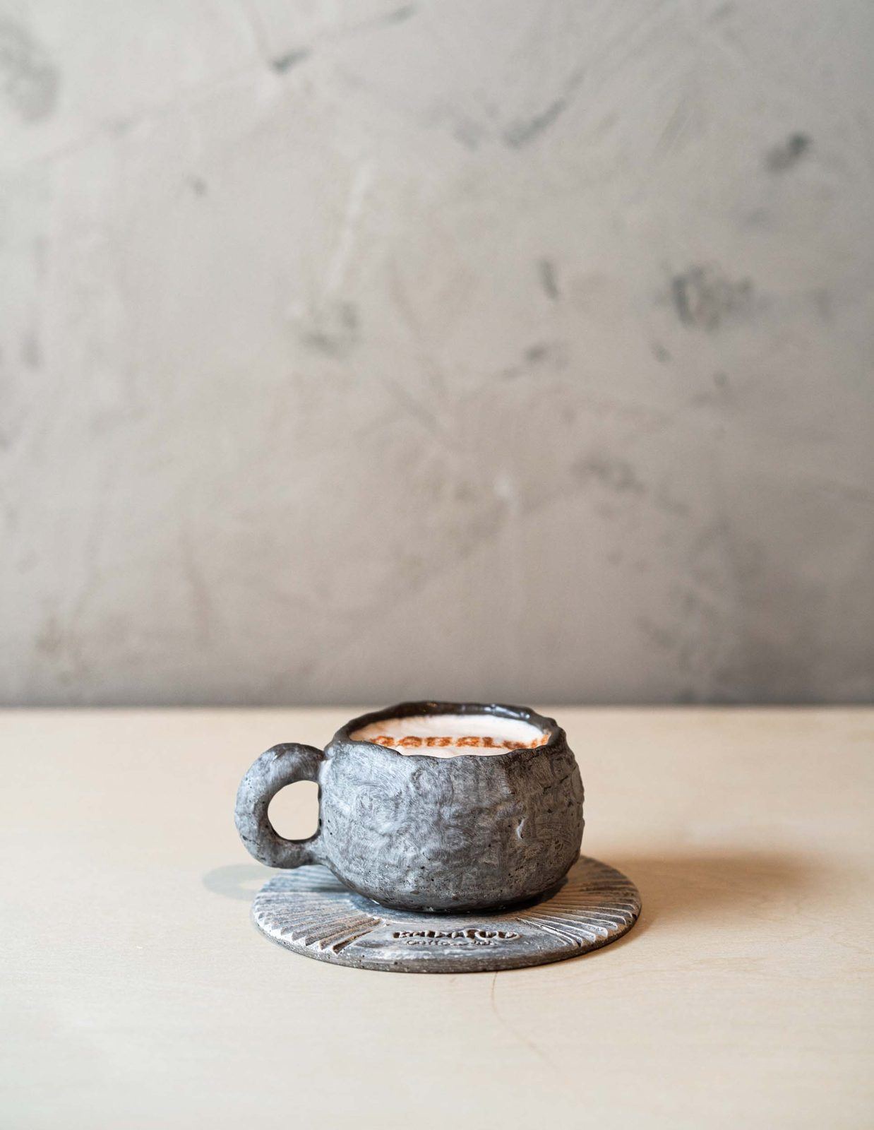 Mocha in a stoneware cup on a saucer