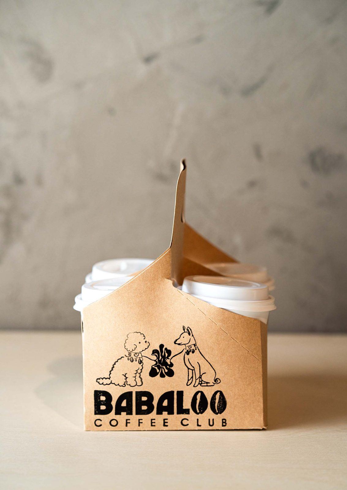 Babaloo pastry box on a stone counter